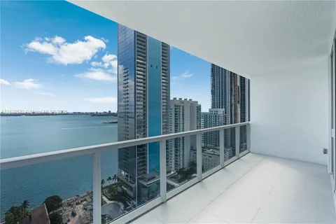 a view of balcony with furniture