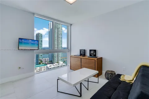 a workspace with furniture and window