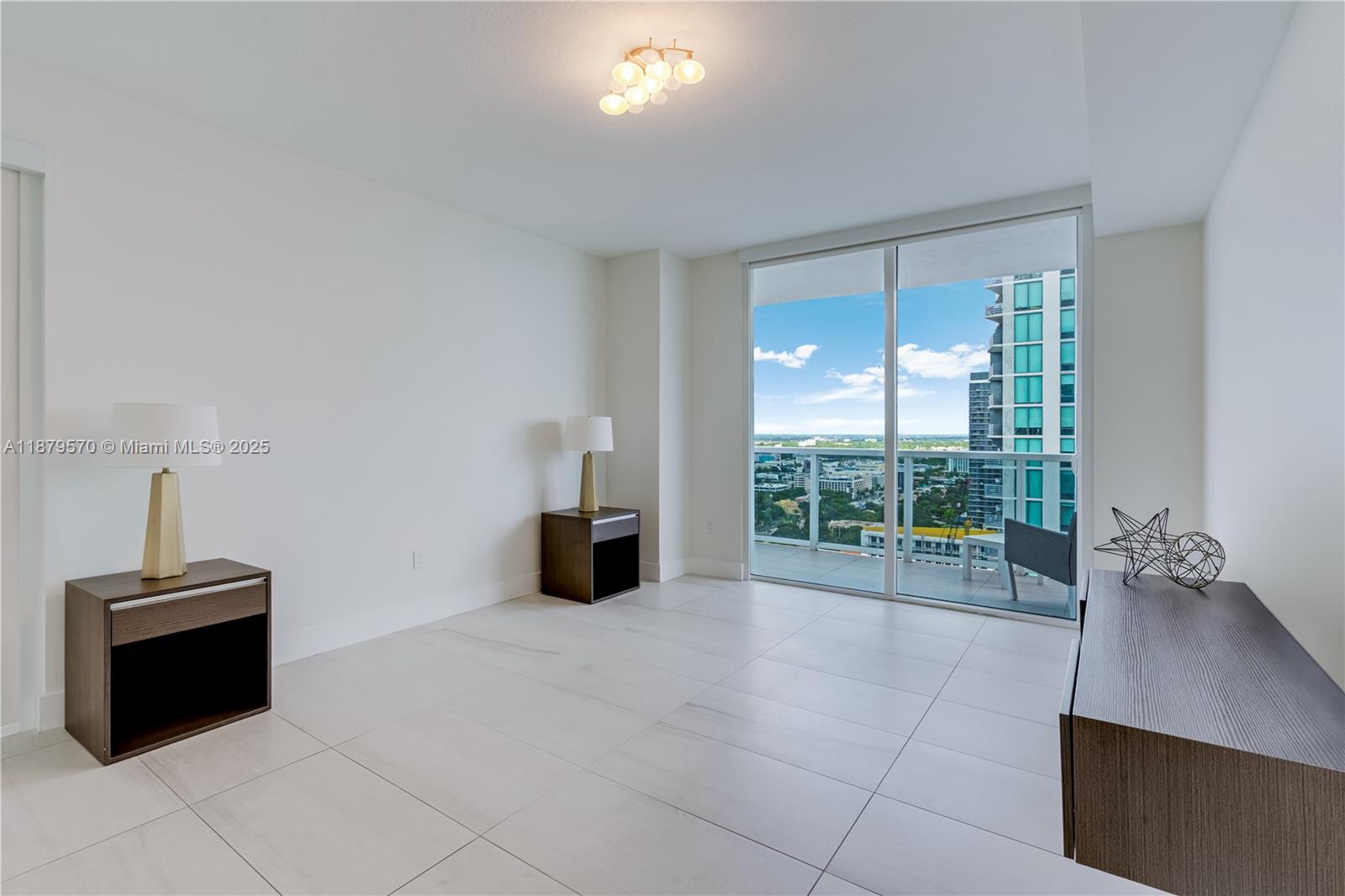 600 Northeast 27th Street, Unit 2801 Miami, FL 33137 - Photo 30 of 48 a view of a room with furniture and a window