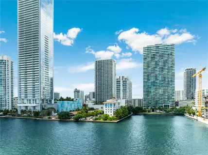 a view of a city with tall buildings