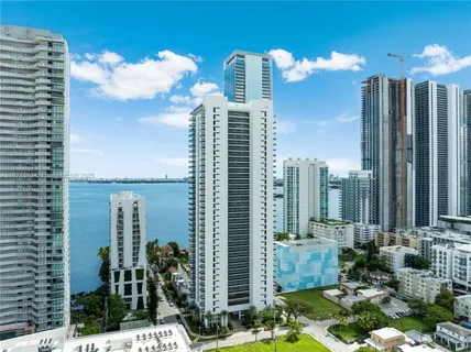 a view of a city with tall buildings