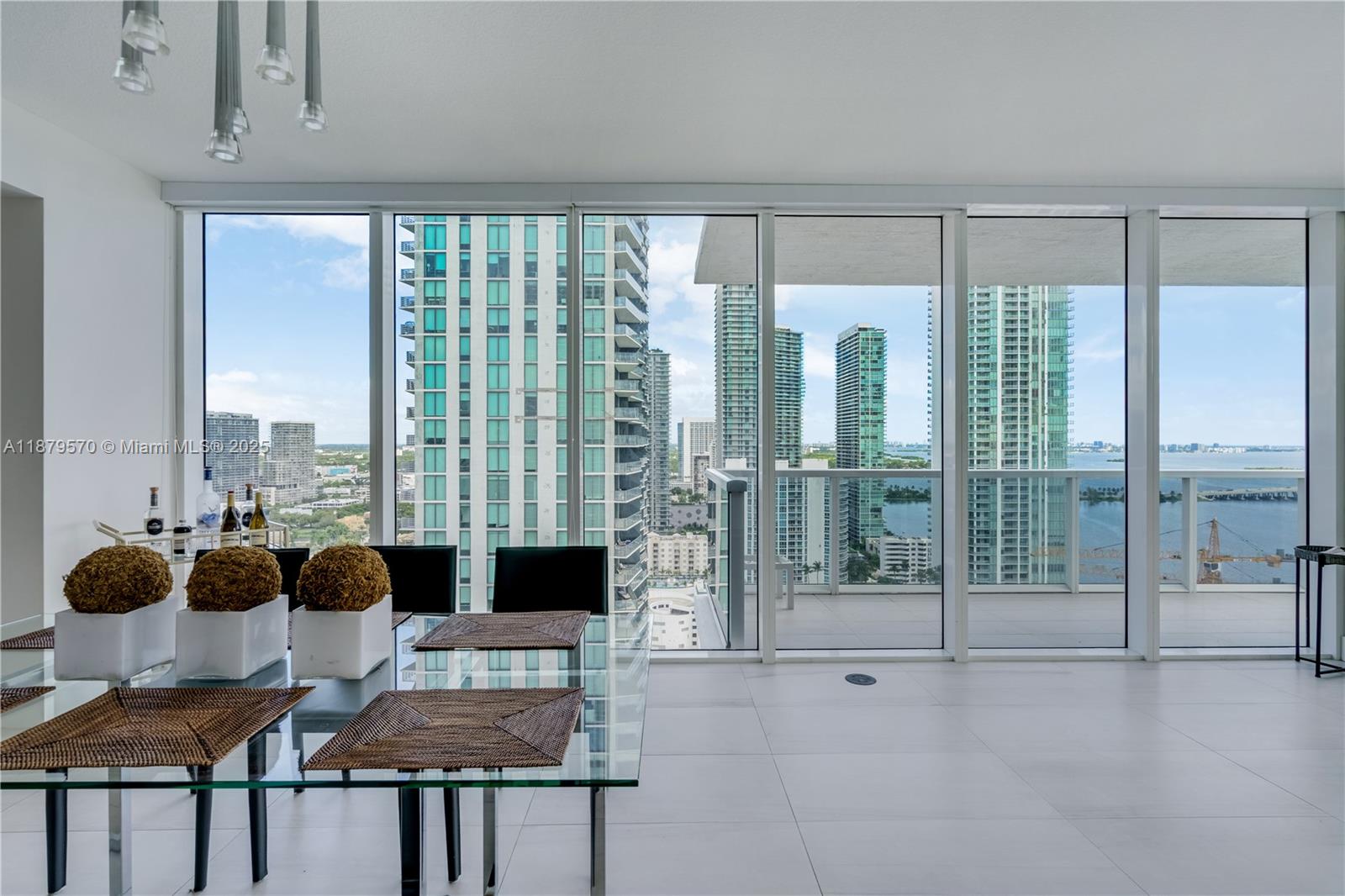 600 Northeast 27th Street, Unit 2801 Miami, FL 33137 - Photo 6 of 48 a living room with furniture and a floor to ceiling window
