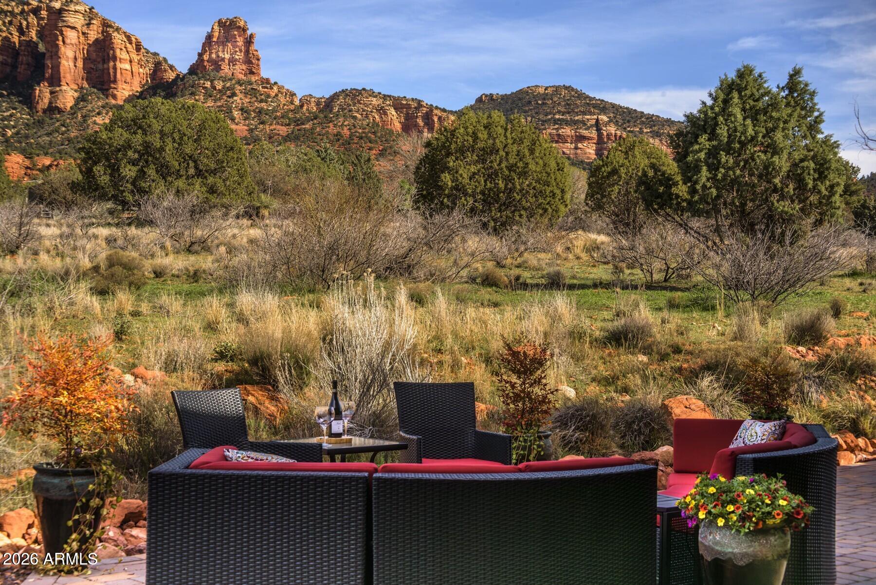 25 Cathedral Ranch Drive Sedona, AZ 86351 - Photo 13 of 40 a view of a lake with a mountain in the background
