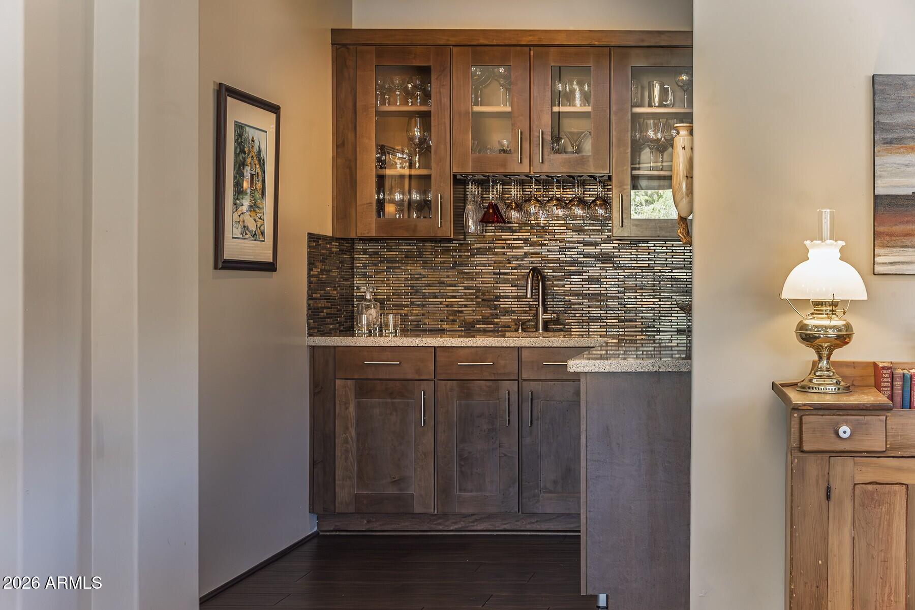 25 Cathedral Ranch Drive Sedona, AZ 86351 - Photo 17 of 40 a bathroom with a granite countertop sink and a mirror