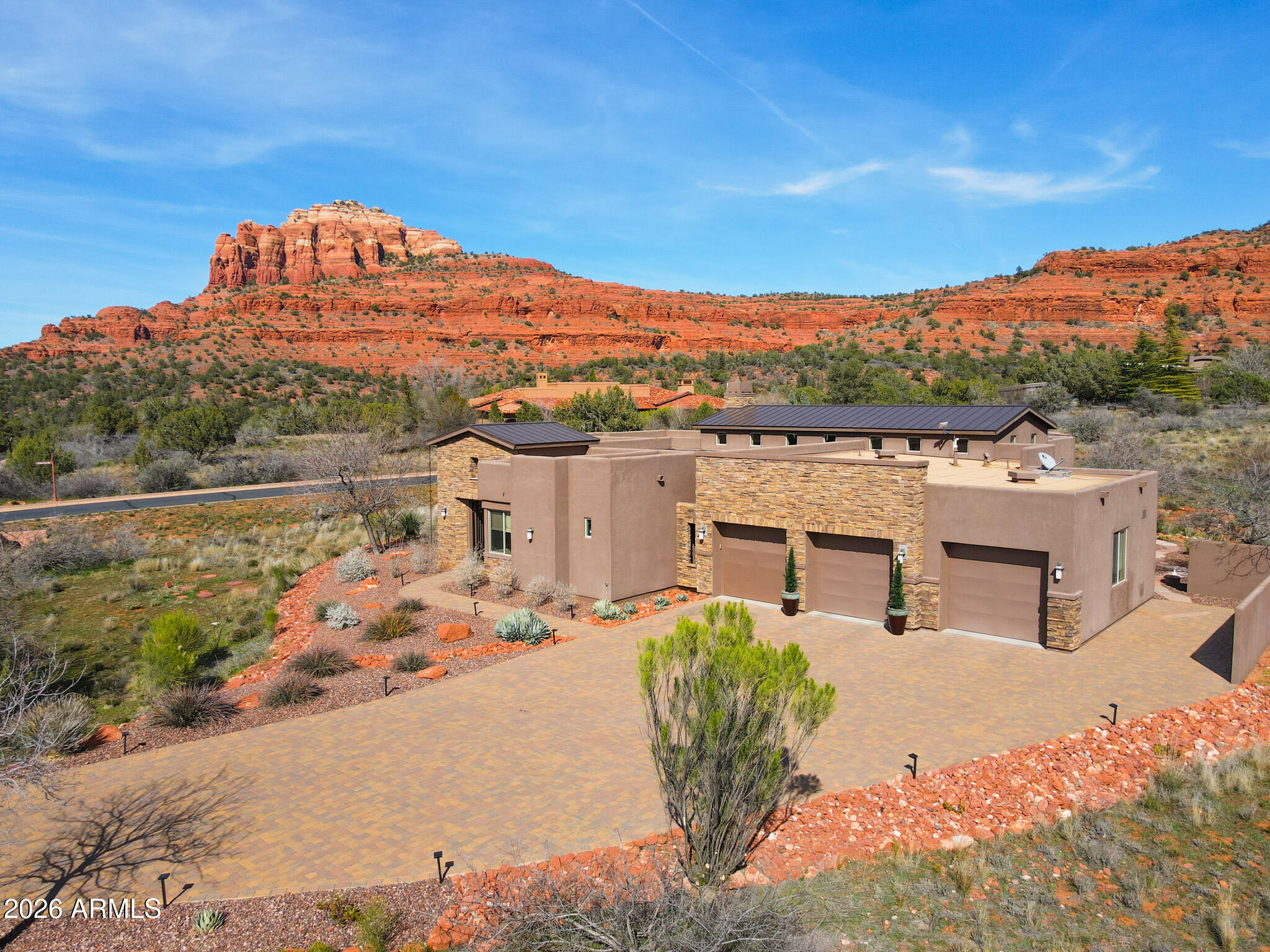 25 Cathedral Ranch Drive Sedona, AZ 86351 - Photo 2 of 40 a view of a lake with a mountain