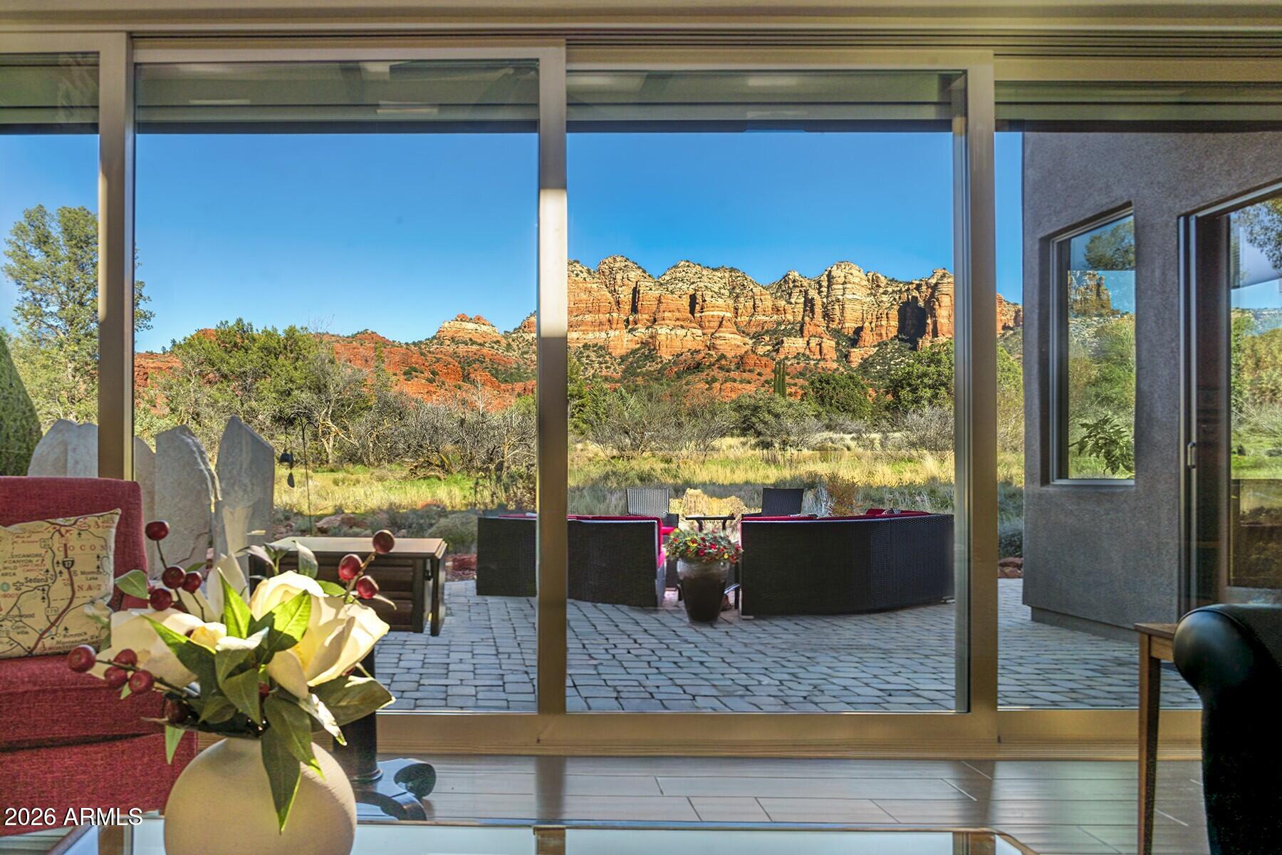 25 Cathedral Ranch Drive Sedona, AZ 86351 - Photo 10 of 40 a view of living room with patio furniture and a potted plant