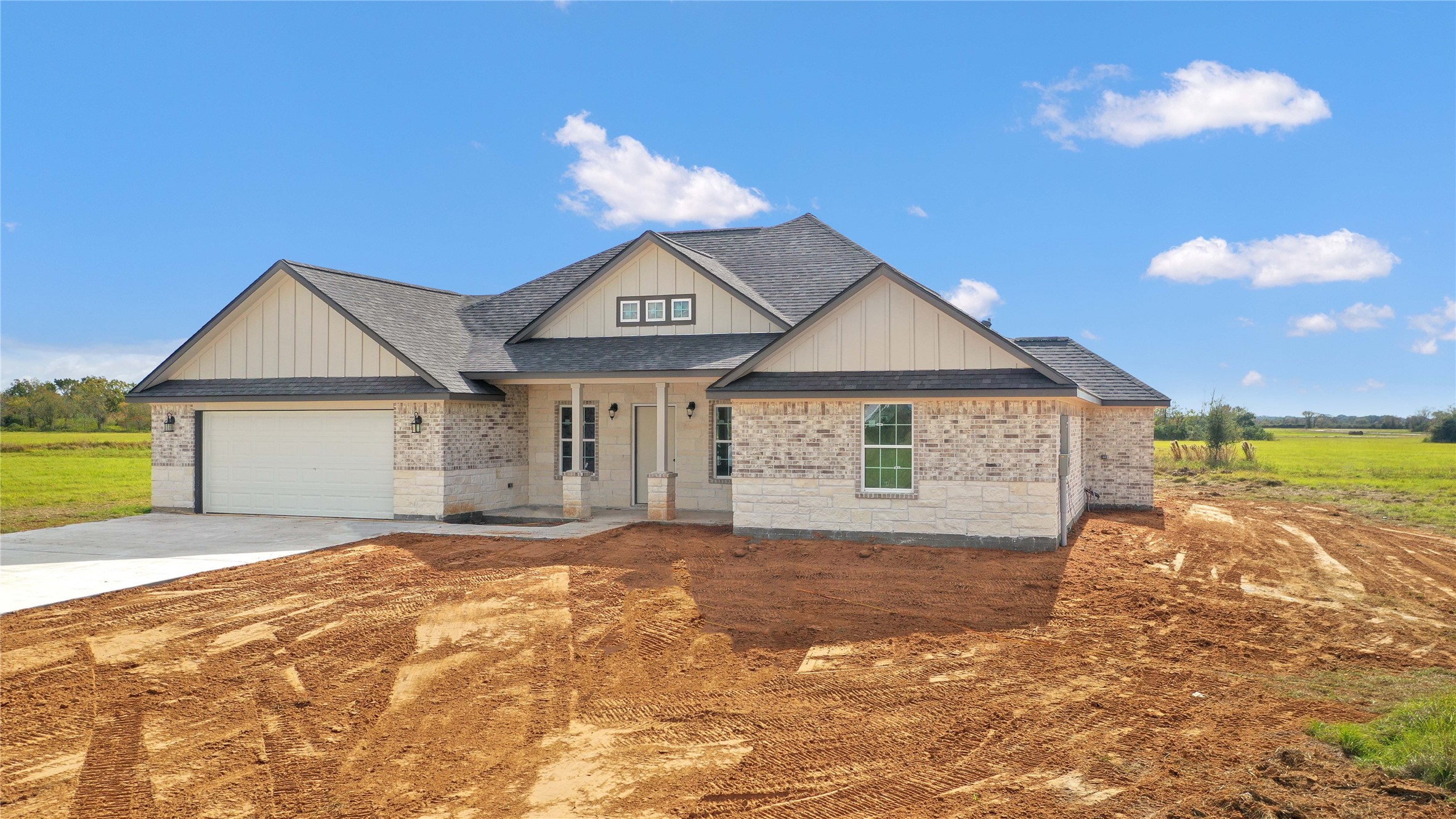 537 Chuckwagon Trail Angleton, TX 77515 - Photo 19 of 19 a view of a house with a yard and garage