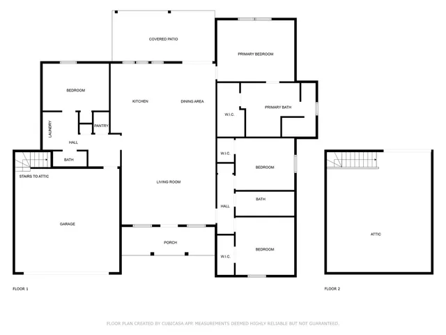 a kitchen with a sink a stove a refrigerator and white cabinets