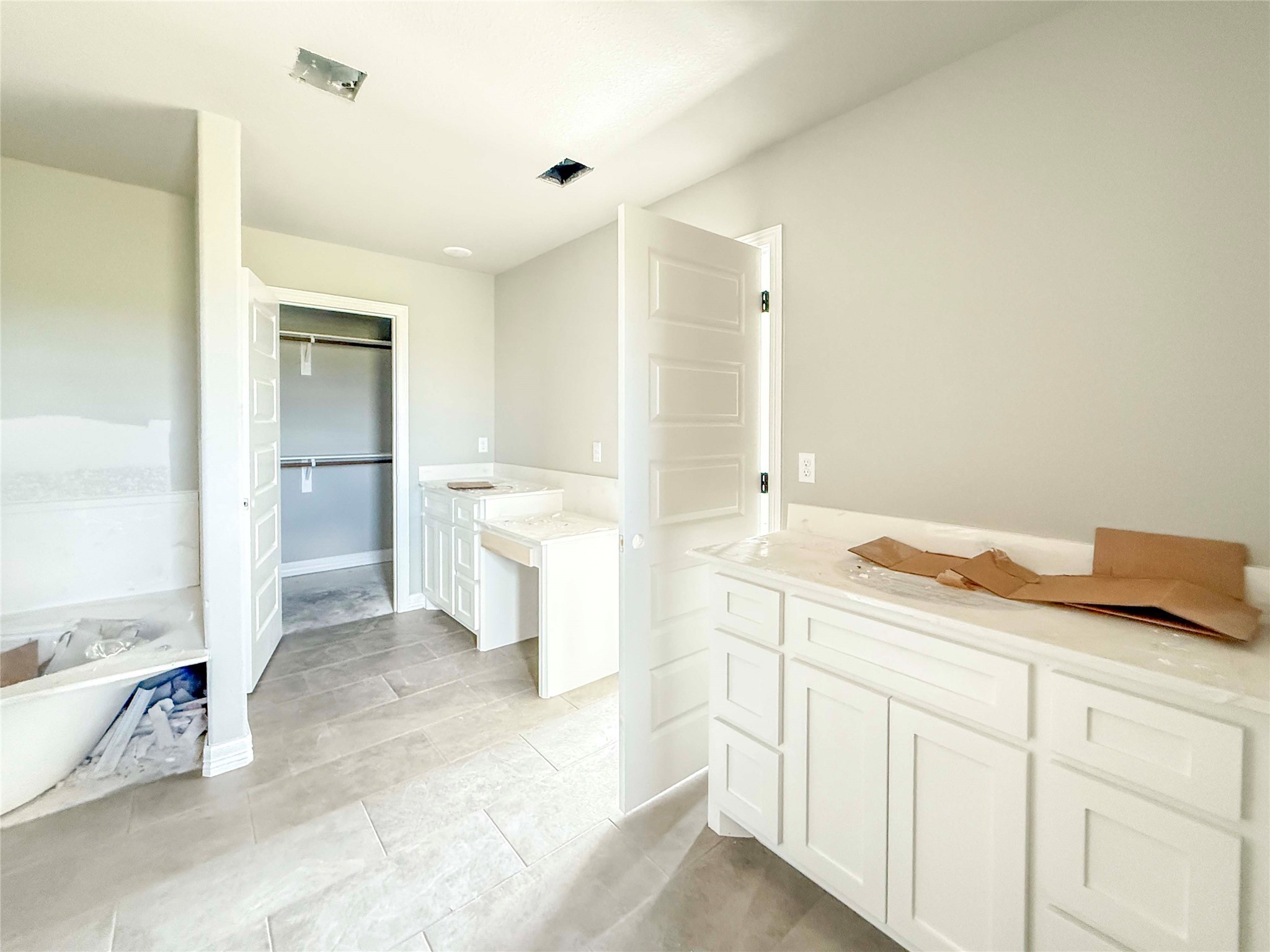 537 Chuckwagon Trail Angleton, TX 77515 - Photo 10 of 19 a spacious bathroom with a granite countertop sink and a mirror
