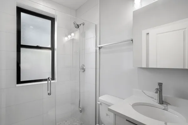 a bathroom with a sink and mirror
