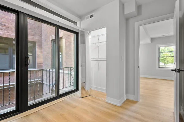 a view of livingroom with floor to ceiling window