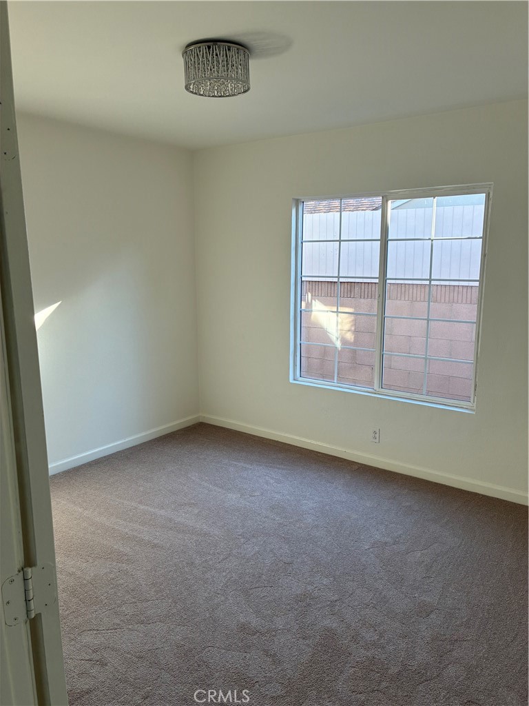 1326 East 15th Street Santa Ana, CA 92701 - Photo 17 of 21 an empty room with a empty space and windows