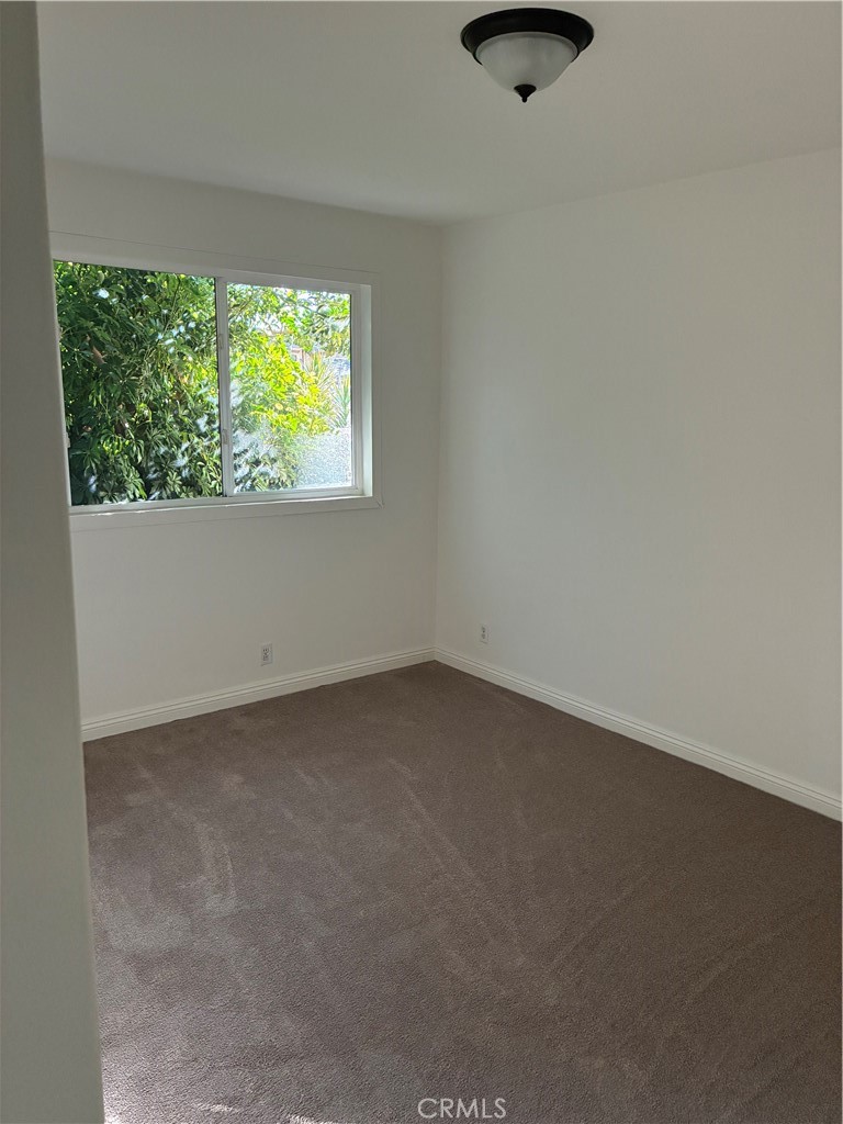 1326 East 15th Street Santa Ana, CA 92701 - Photo 18 of 21 a view of an empty room with a window