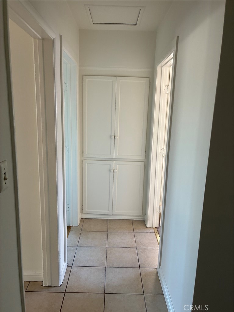 1326 East 15th Street Santa Ana, CA 92701 - Photo 19 of 21 a view of a closet area in a house