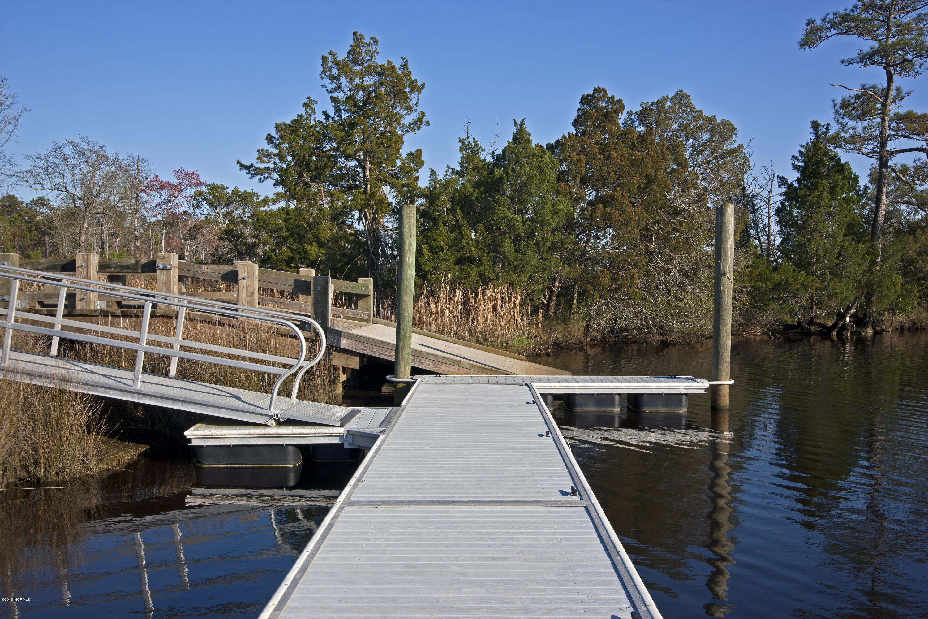 611 Tom Nevers Way Holly Ridge, NC 28445 - Photo 53 of 56 Day Dock and Boat Ramp