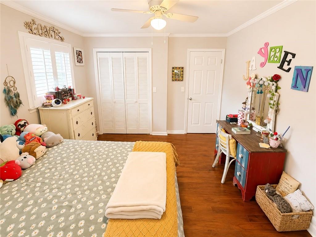 225 Pineridge Road Bogart, GA 30622 - Photo 35 of 53 a bed room with a bed and a chair