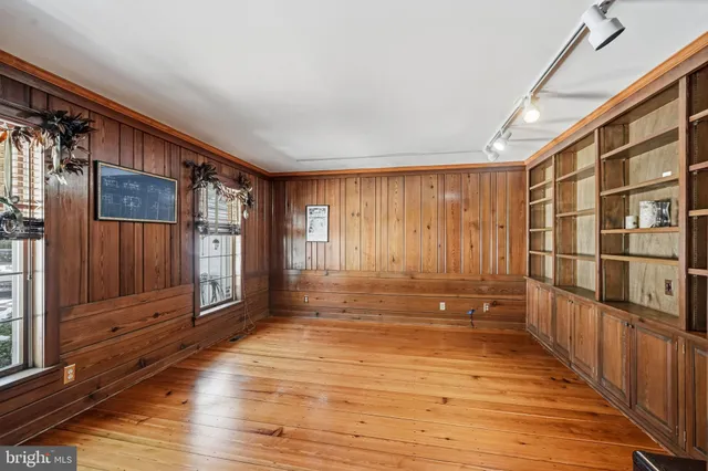 a view of a bathroom with a shower and a window