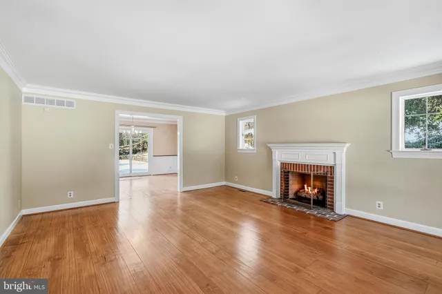 a bathroom with a granite countertop toilet a sink and a bathtub