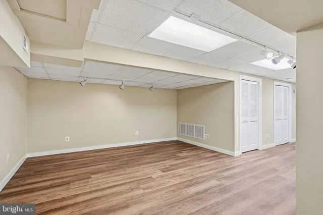 a view of entryway with wooden floor