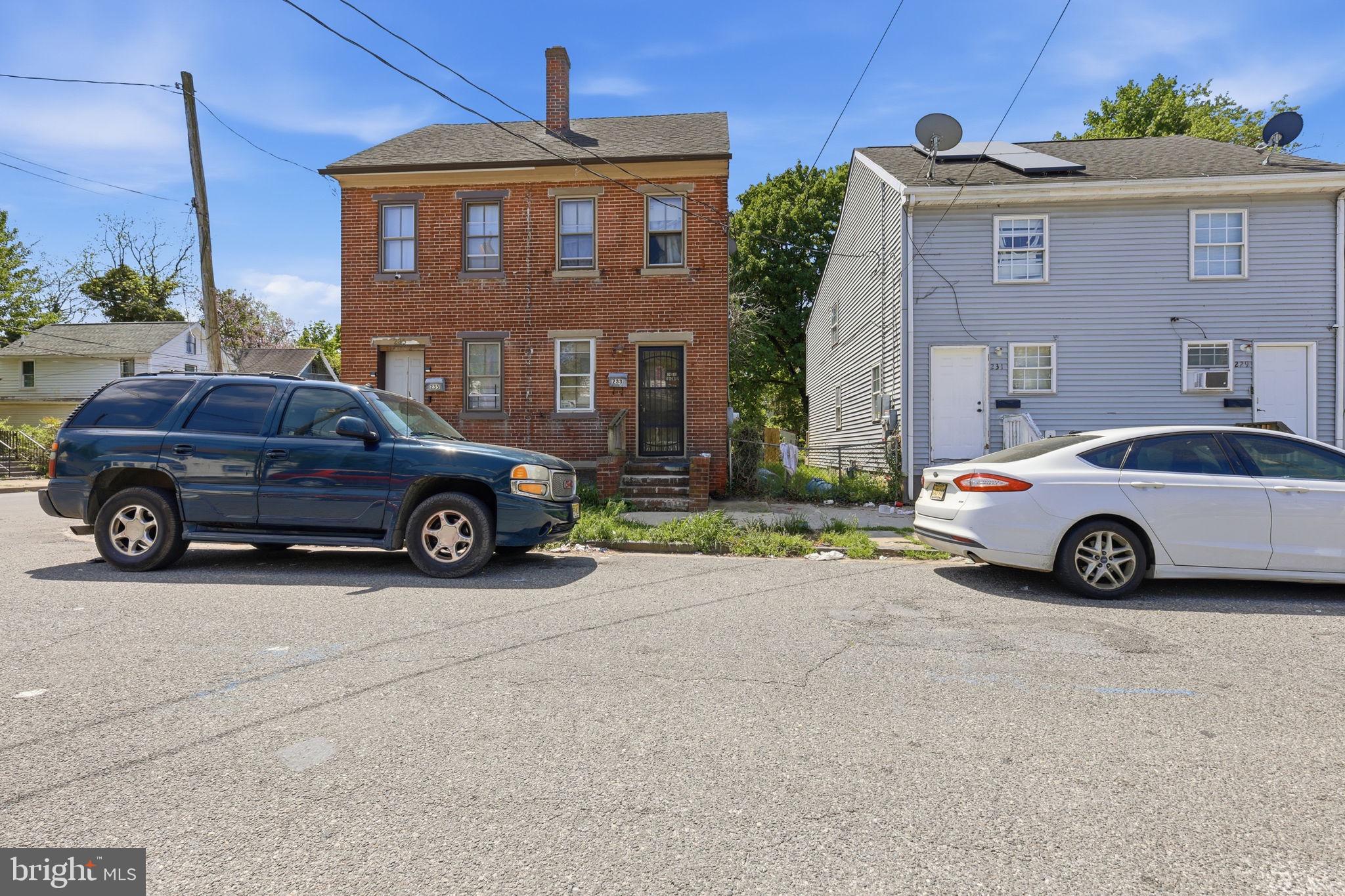 233 Sinnickson Street Salem, NJ 08079 - Photo 1 of 7 a view of a car parked in front of a house