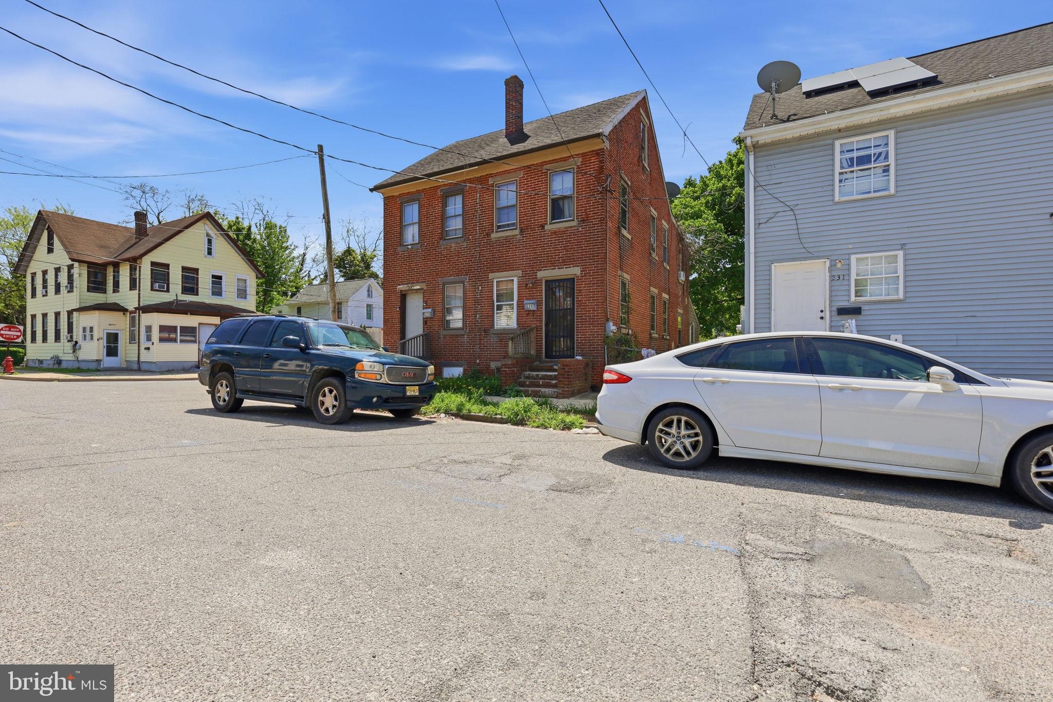 233 Sinnickson Street Salem, NJ 08079 - Photo 2 of 7 a car parked in front of a house
