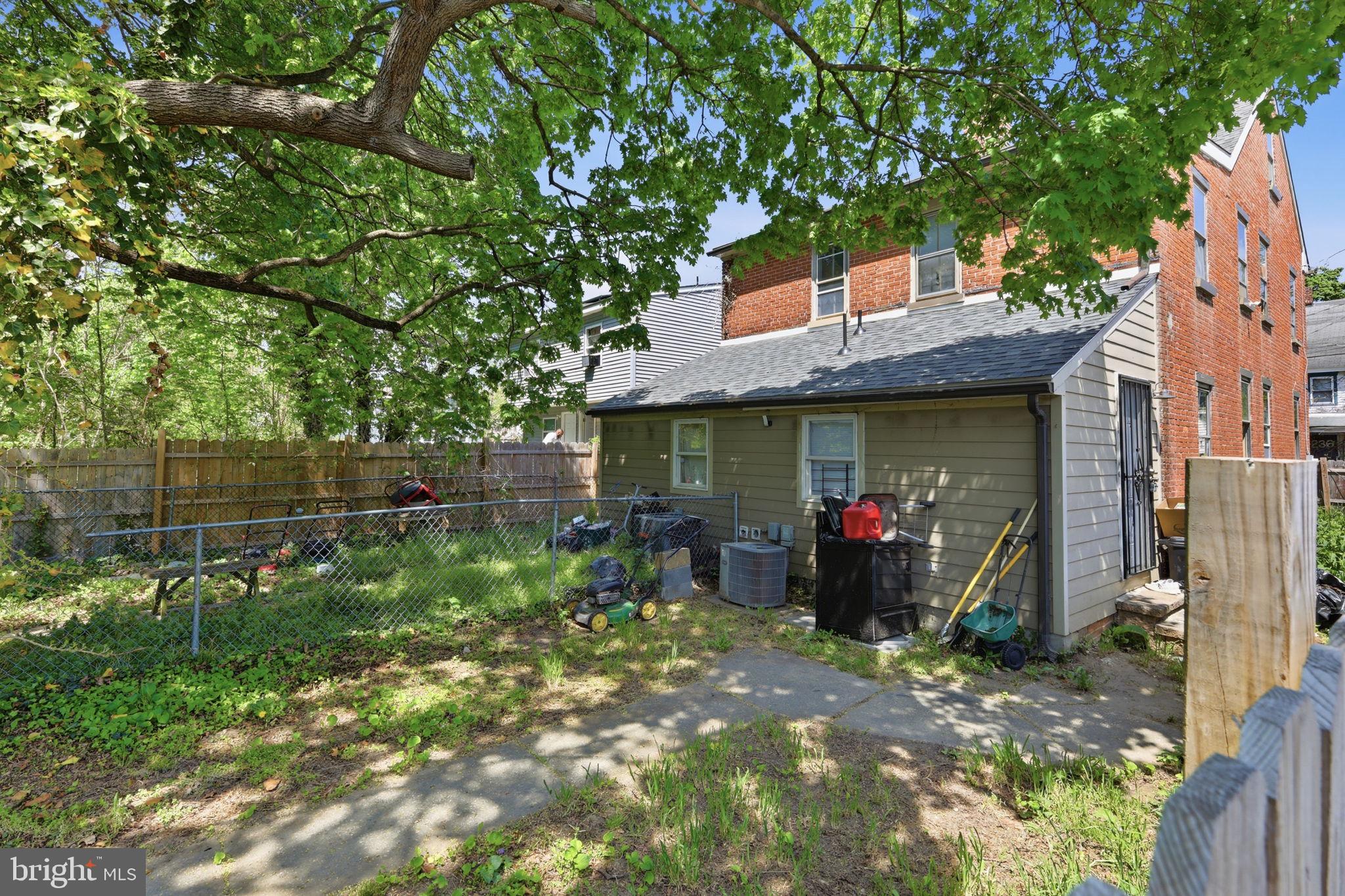 233 Sinnickson Street Salem, NJ 08079 - Photo 3 of 7 a view of a house with a backyard
