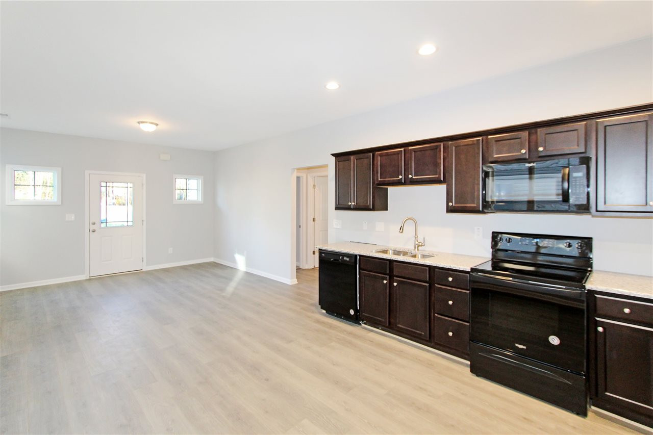 143 Yellow Jacket Ridge Clayton, NC 27520 - Photo 3 of 28 Kitchen/Family Room