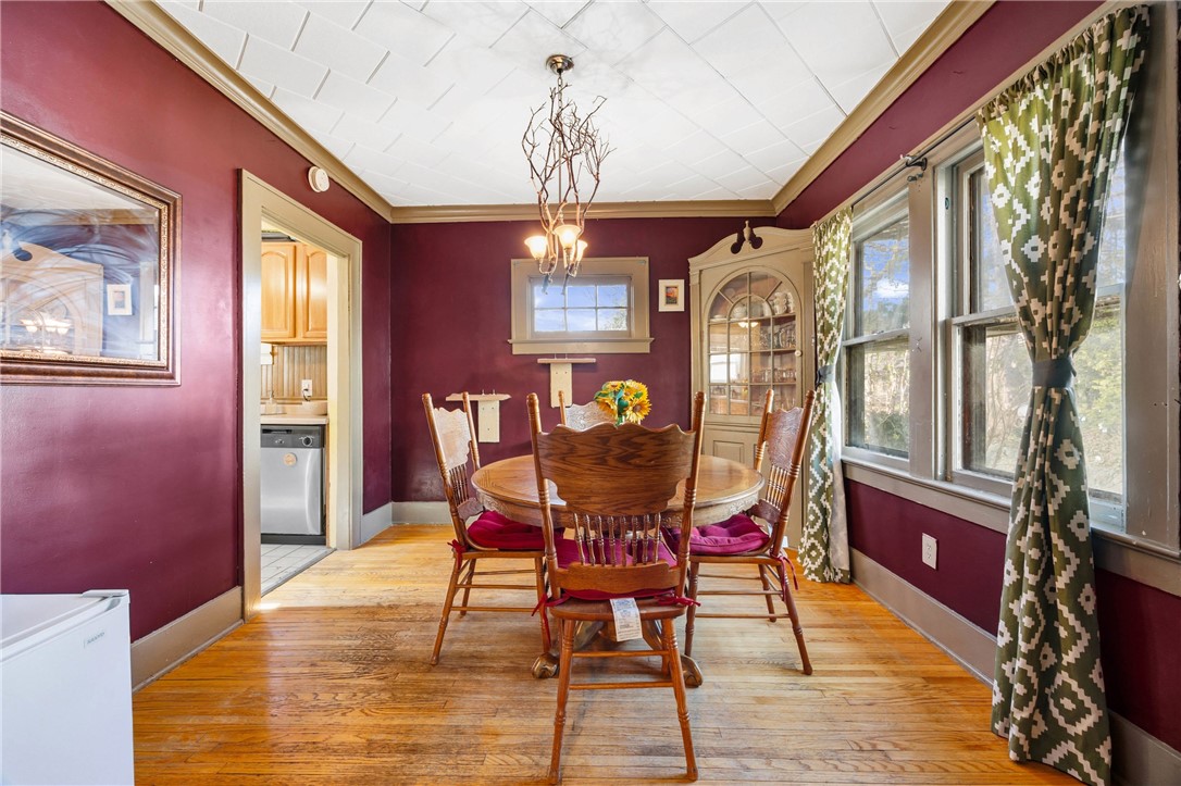 69 Benton Street Rochester, NY 14620 - Photo 8 of 23 Formal dining with built-in display cabinets
