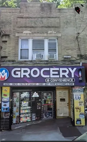 a living room with lots of furniture and a rug