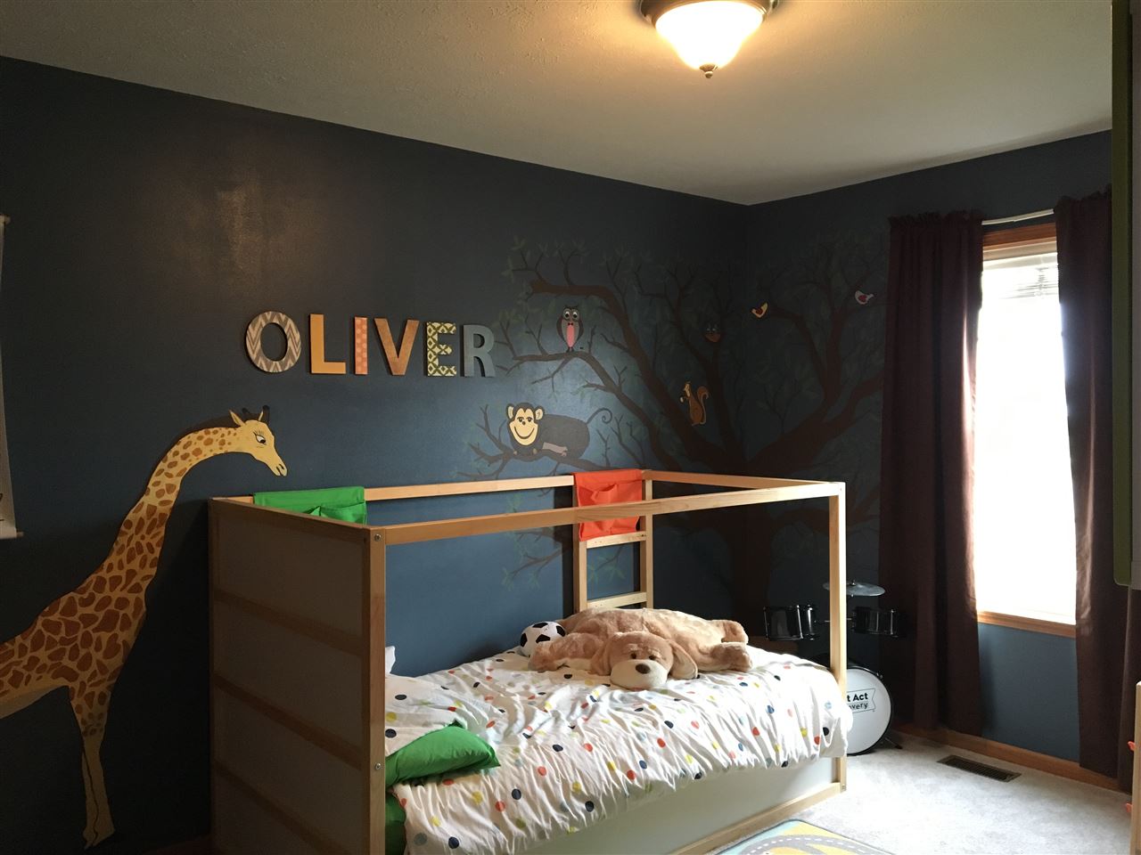 503 South Regulators Street Rochelle, IL 61068 - Photo 12 of 14 a bedroom with a bed and a dresser