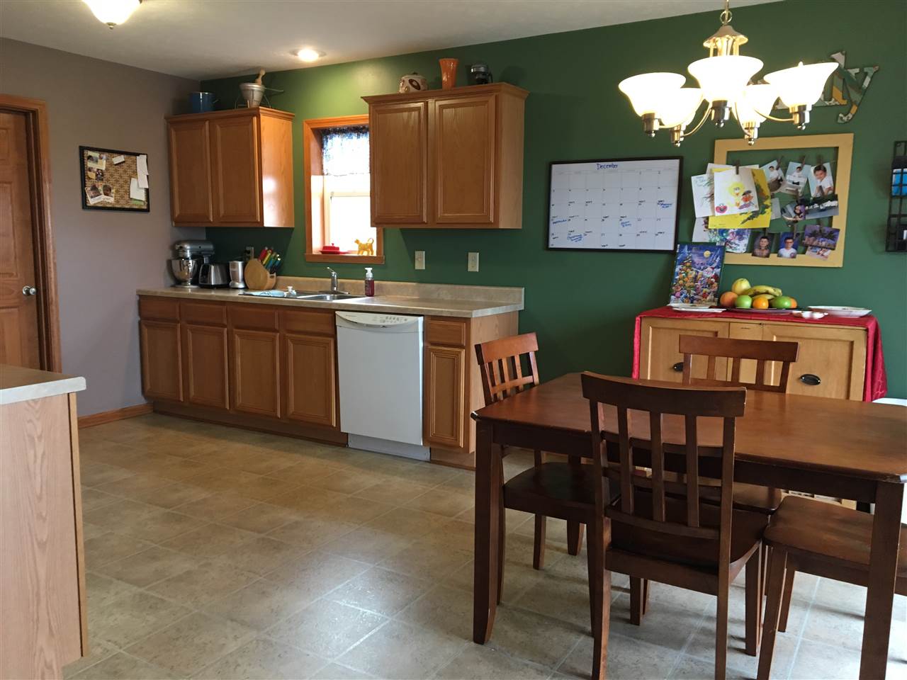 503 South Regulators Street Rochelle, IL 61068 - Photo 3 of 14 a kitchen that has a table and chairs in it