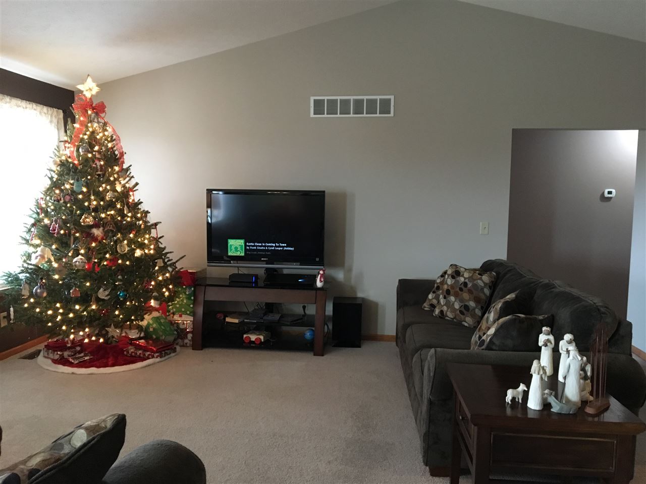 503 South Regulators Street Rochelle, IL 61068 - Photo 8 of 14 a living room with furniture and a flat screen tv