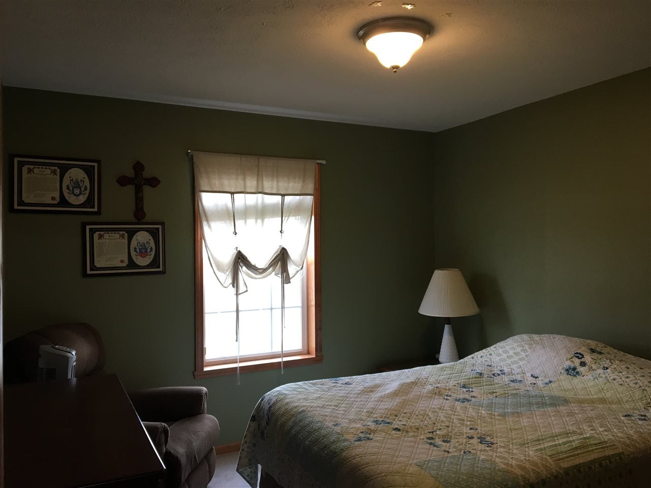 503 South Regulators Street Rochelle, IL 61068 - Photo 10 of 14 a bedroom with a bed and a window
