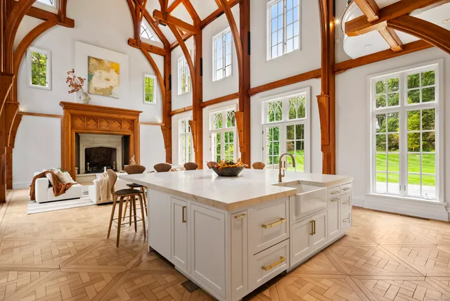 a very nice looking kitchen with a large window
