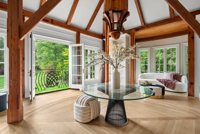 a living room with large windows