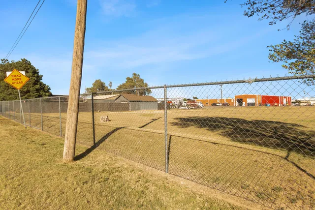 a view of a balcony with chairs