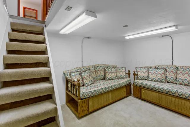 a living room with furniture and a couch