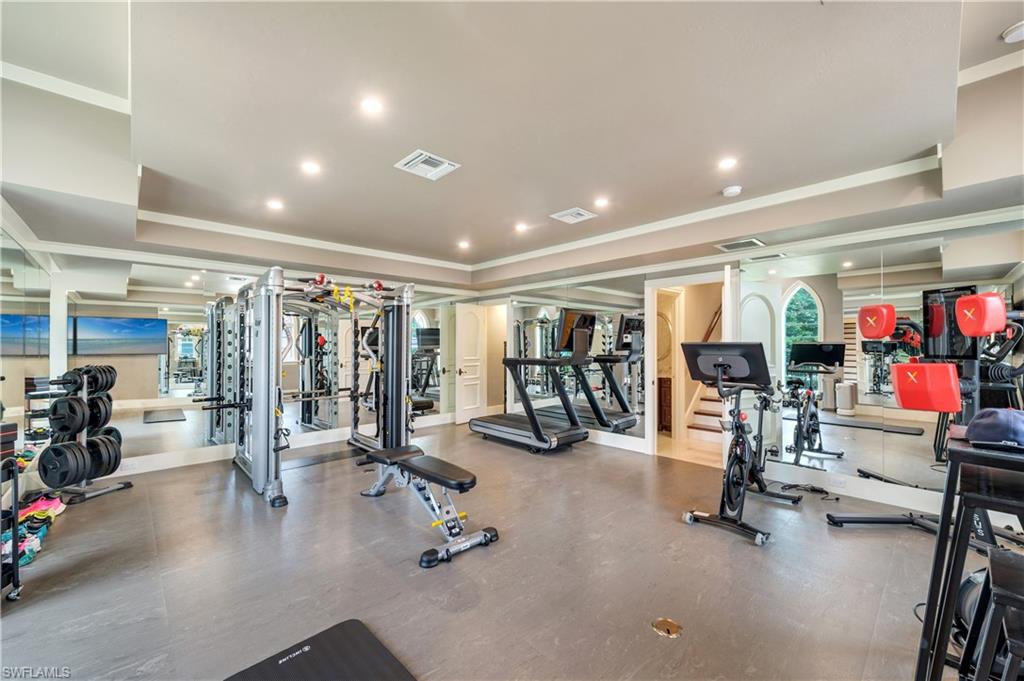 2300 Kingfish Road Naples, FL 34102 - Photo 30 of 36 a view of a room with gym equipment
