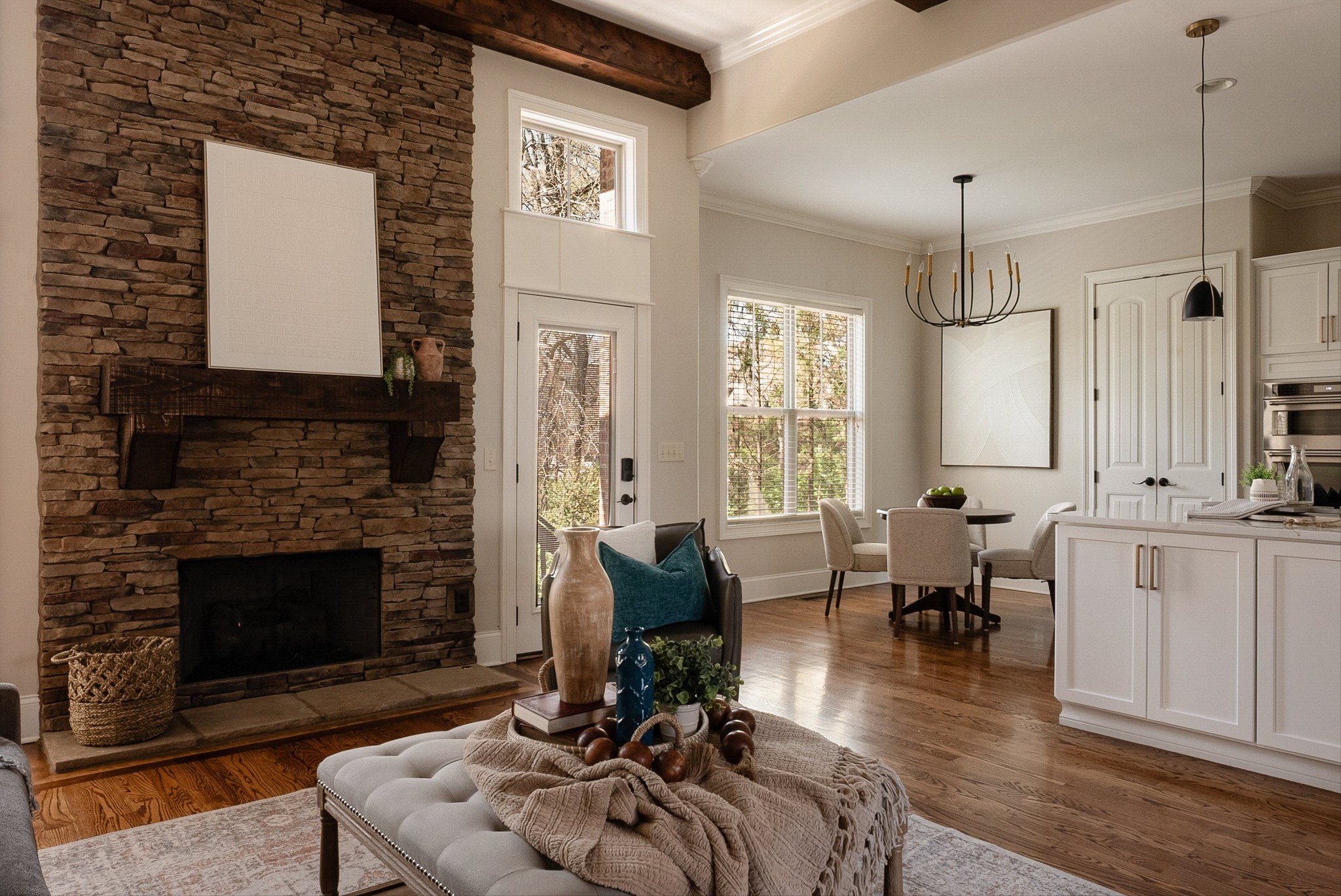 1058 Alice Springs Circle Spring Hill, TN 37174 - Photo 11 of 54 a living room with furniture a fireplace and a floor to ceiling window