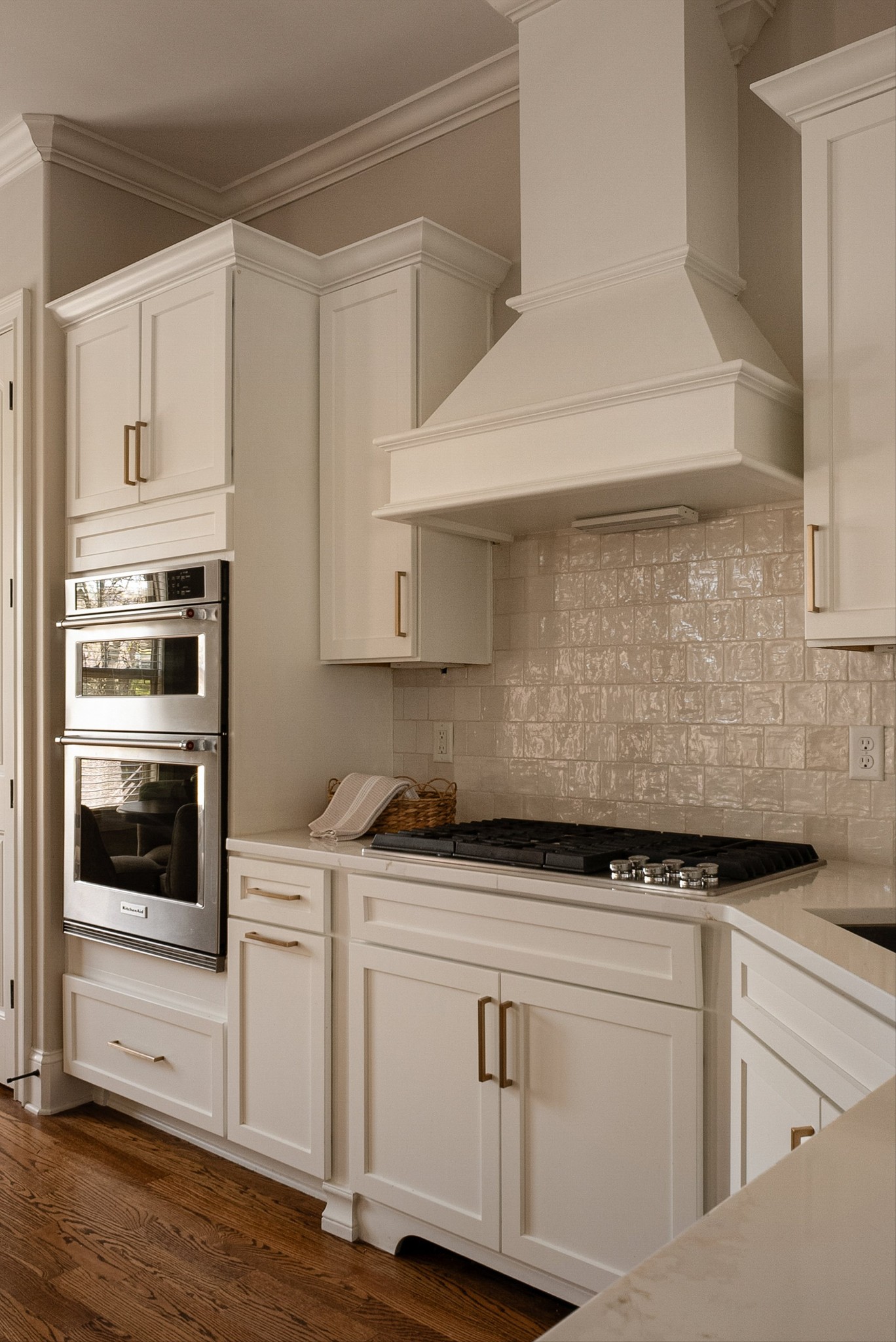 1058 Alice Springs Circle Spring Hill, TN 37174 - Photo 17 of 54 a kitchen with granite countertop white cabinets and white appliances