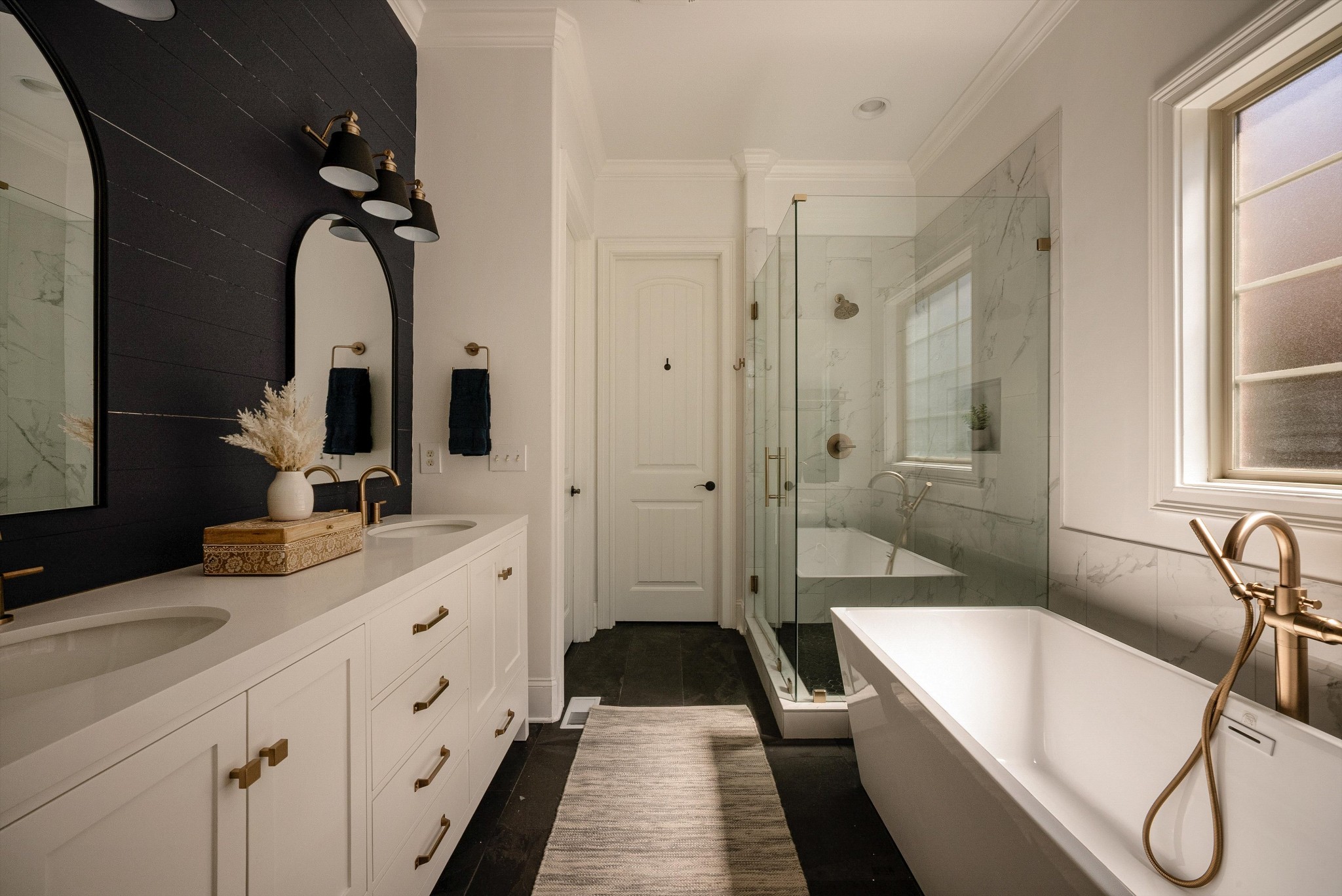 1058 Alice Springs Circle Spring Hill, TN 37174 - Photo 23 of 54 a bathroom with a double vanity sink mirror and bathtub