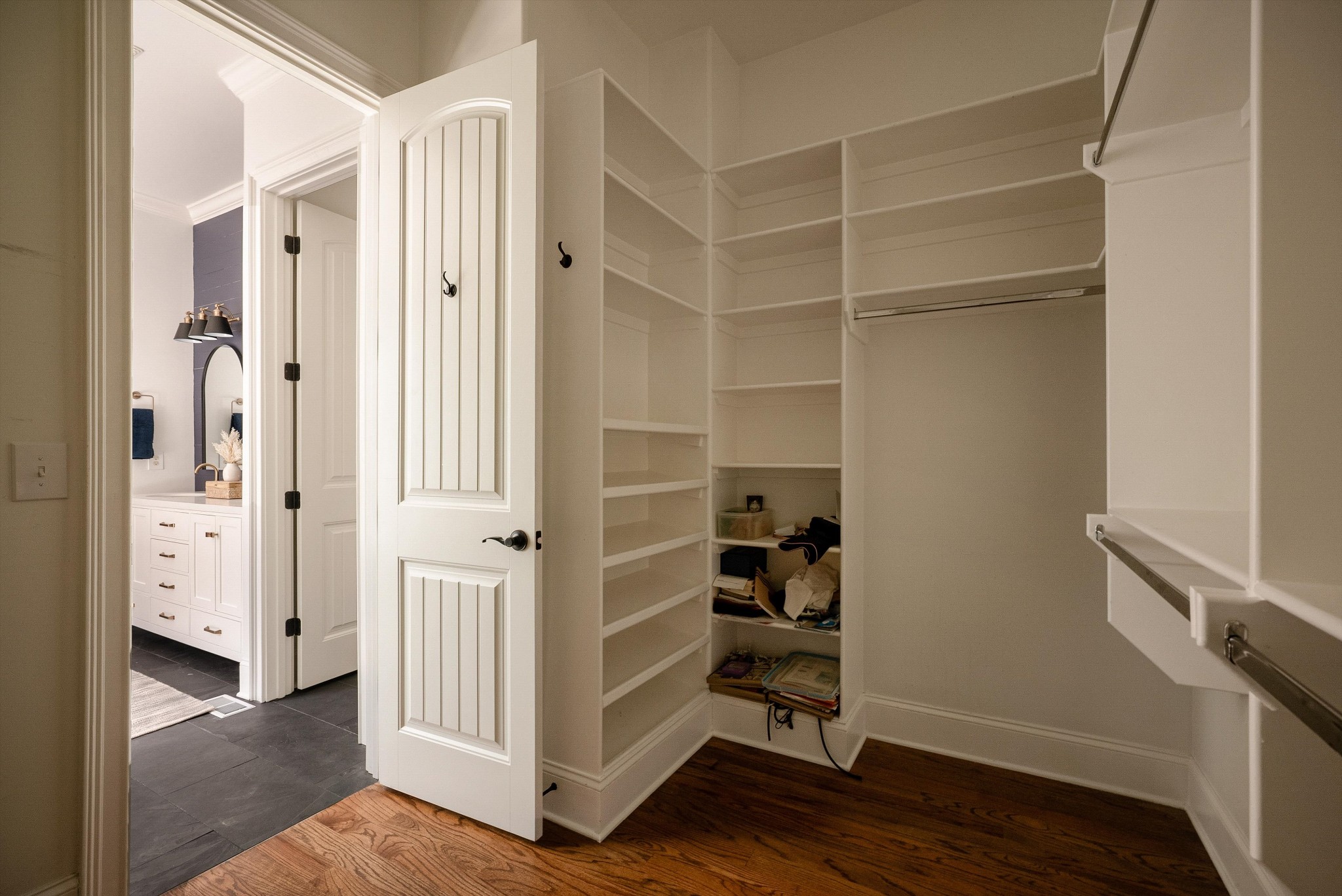 1058 Alice Springs Circle Spring Hill, TN 37174 - Photo 29 of 54 a view of walk in closet with wooden floor and closet