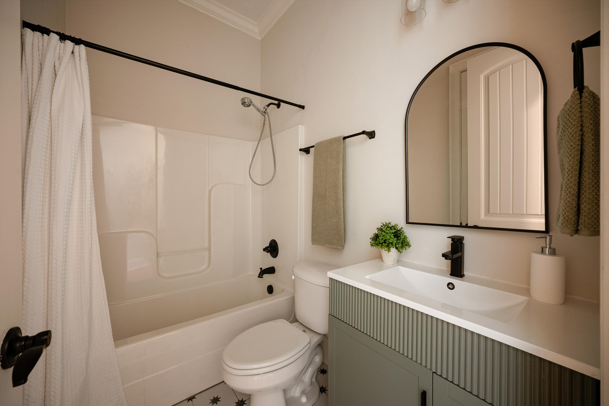 1058 Alice Springs Circle Spring Hill, TN 37174 - Photo 33 of 54 a bathroom with a sink a toilet and a shower