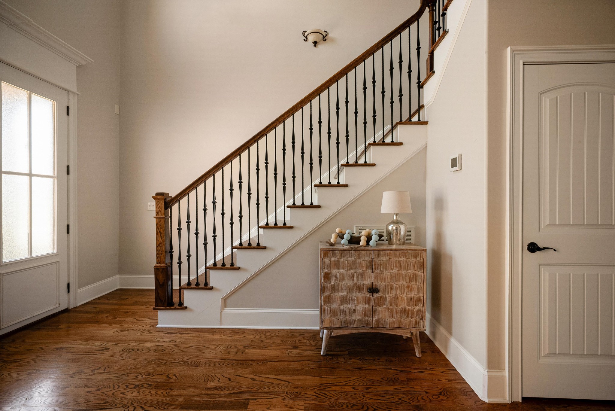 1058 Alice Springs Circle Spring Hill, TN 37174 - Photo 5 of 54 a view of entryway with wooden floor and stairs