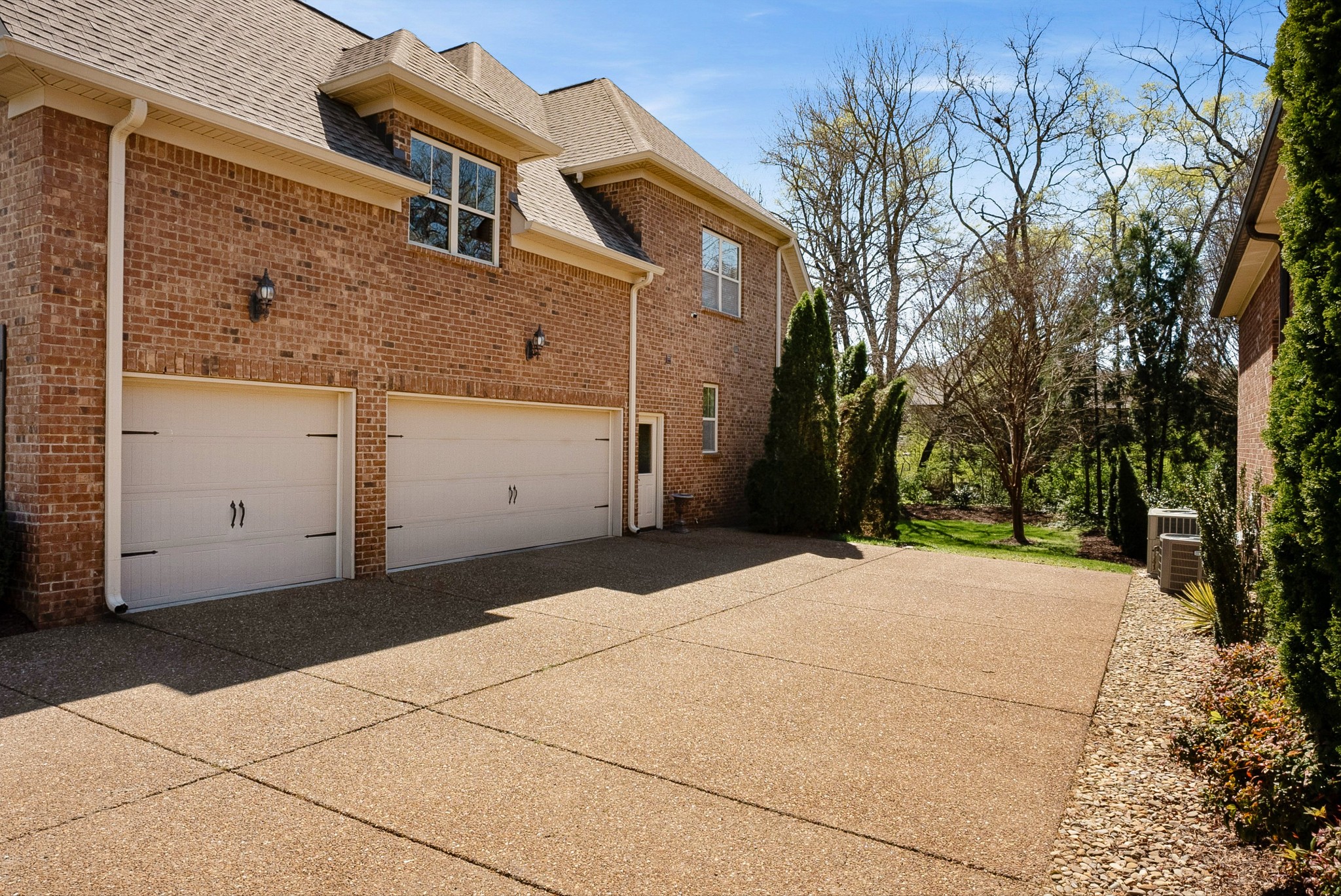 1058 Alice Springs Circle Spring Hill, TN 37174 - Photo 54 of 54 a front view of a house with a yard and garage