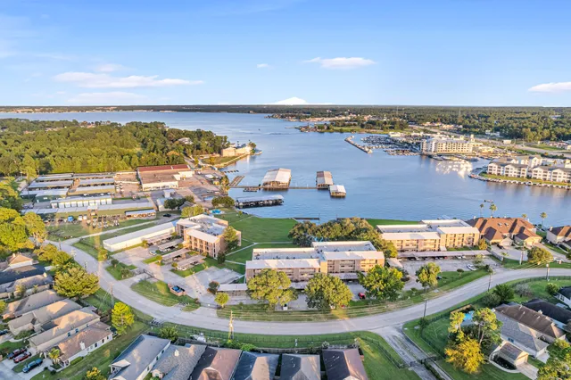 a view of a park with houses