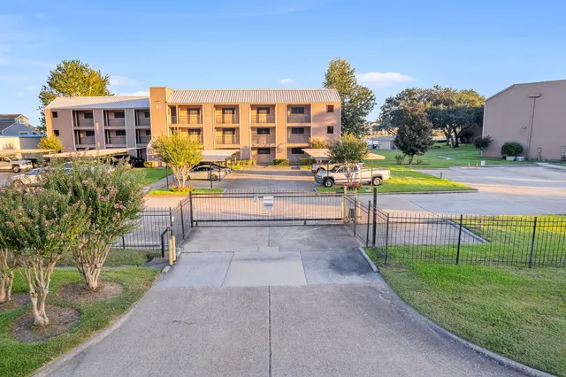 an aerial view of a house with a ocean view