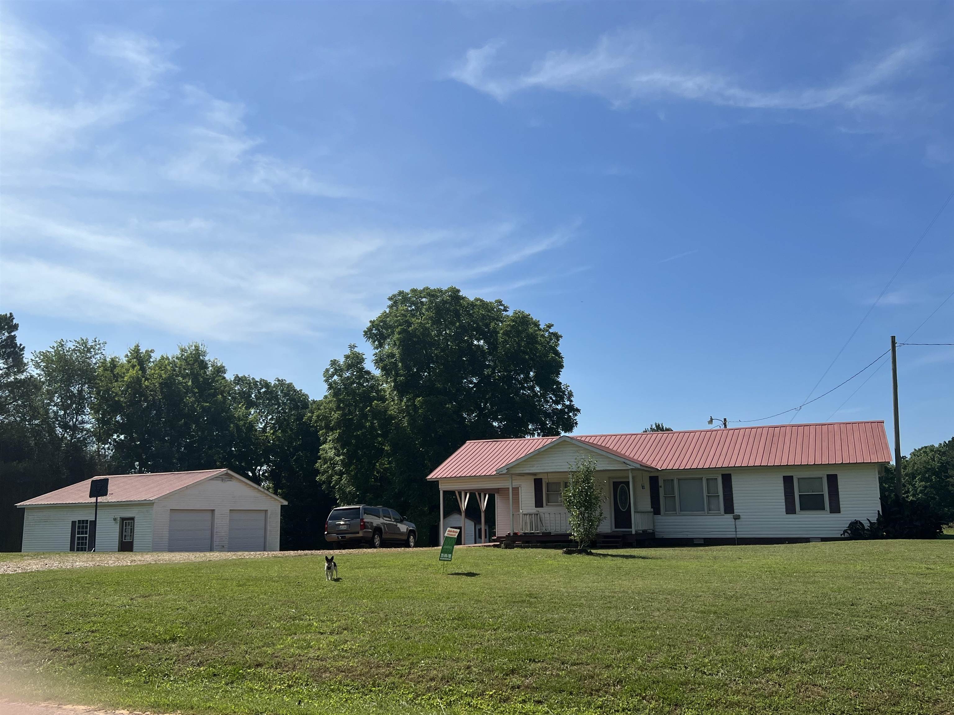 2388 Chambers Store Road Michie, TN 38357 - Photo 12 of 13 a view of a house with swimming pool in front of it