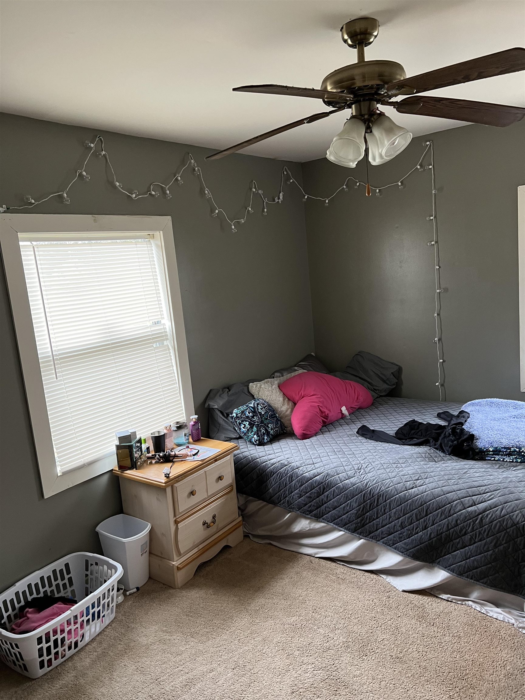 2388 Chambers Store Road Michie, TN 38357 - Photo 9 of 13 a bedroom with a bed and a chandelier
