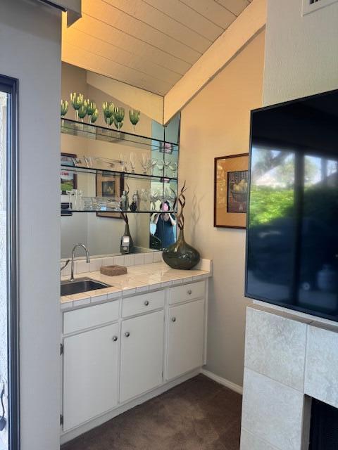 118 Racquet Club Drive South Rancho Mirage, CA 92270 - Photo 29 of 33 a bathroom with a sink and a mirror